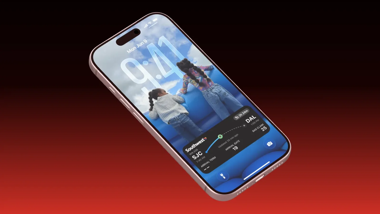An iPhone 17 Pro in a three-quarter view against a black to red gradient, its display showing a lock screen with 9:41 and a flight.
