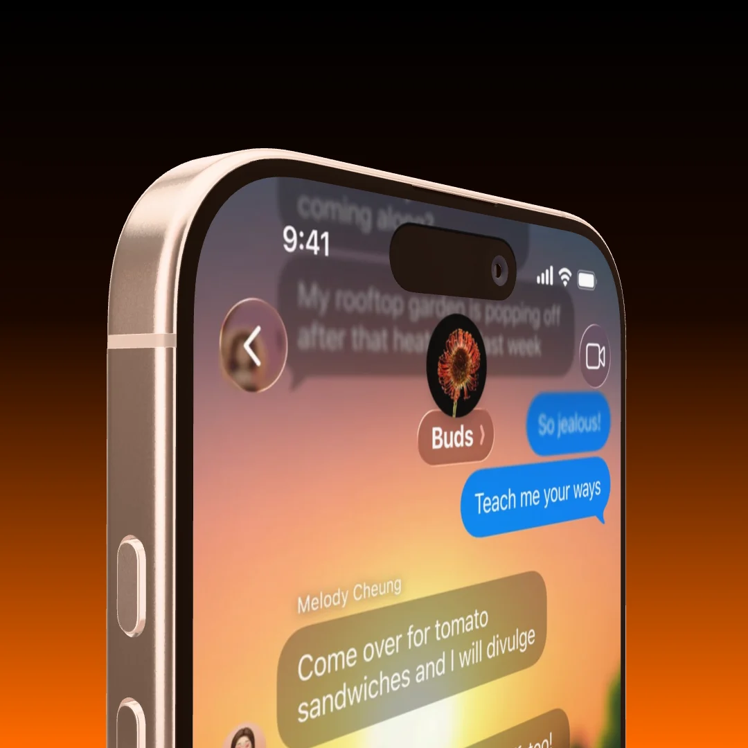 A phone seen close up from below against a black to orange gradient